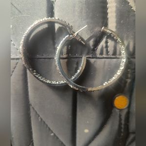 Women's pierced hoop earrings